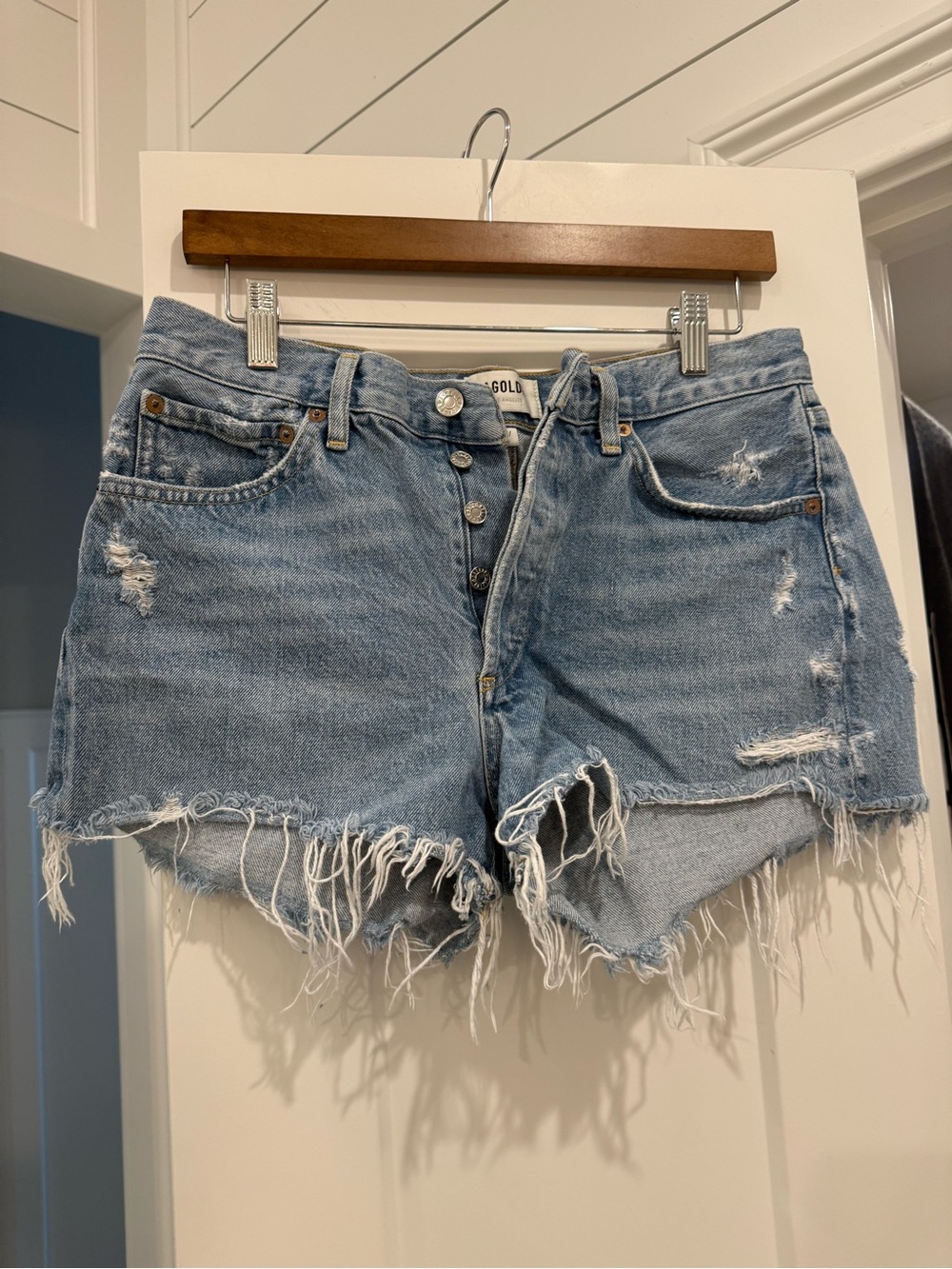 Agolde Light Blue Distressed Denim Cutoff Shorts